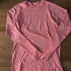 Size 12 Lululemon swiftly tech in coral color.